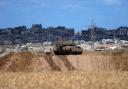 An Israeli tank overlooks the Gaza Strip